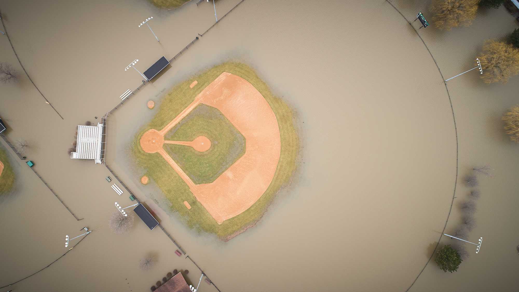 Flooded baseball diamond from above.