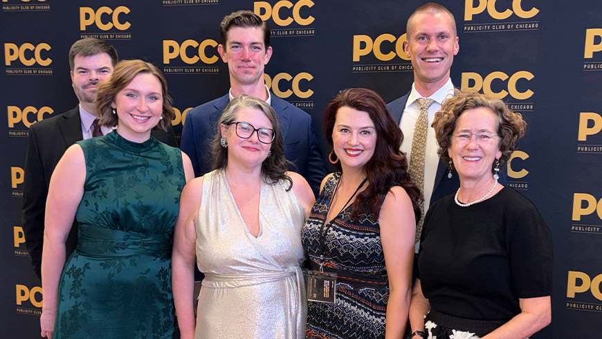 CMAP staff posing together on red carpet at Publicity Club of Chicago event