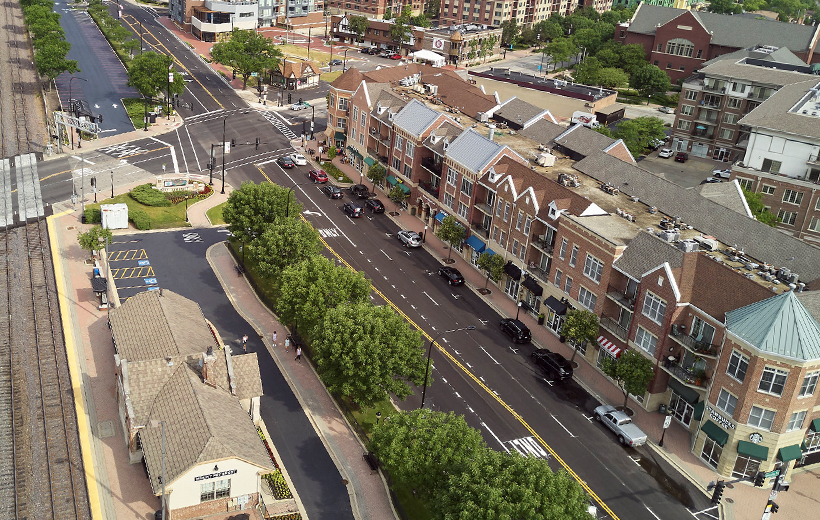 Birdseye view of a new townhouse development adjacent to a Metra station