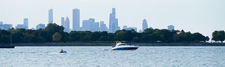 photograph of Lake Michigan with boats and the Chicago skyline in the background