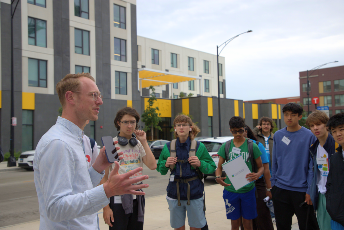 Photo of FLIP students hearing from architect David Rader. 