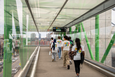 Photo of FLIP students walking through the Damen Green Line Station.